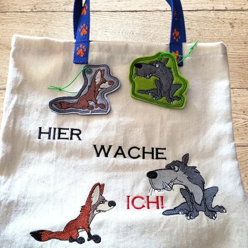 ITH Stickdatei Wolf und Coyote mit Sprüchen
