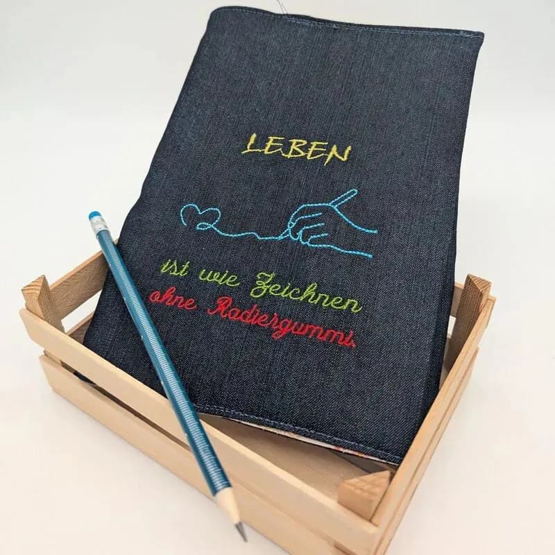 Stickdatei Spruch Leben ist... mit Grafik